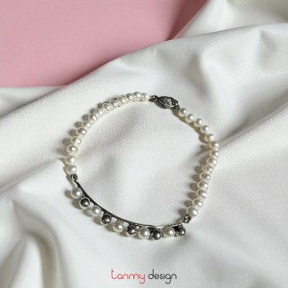 Vòng tay ngọc trai phối thanh bạc phối bi 